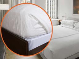 호텔 <strong>이불</strong> 밑에 있는 '얇은 시트'의 진짜 용도